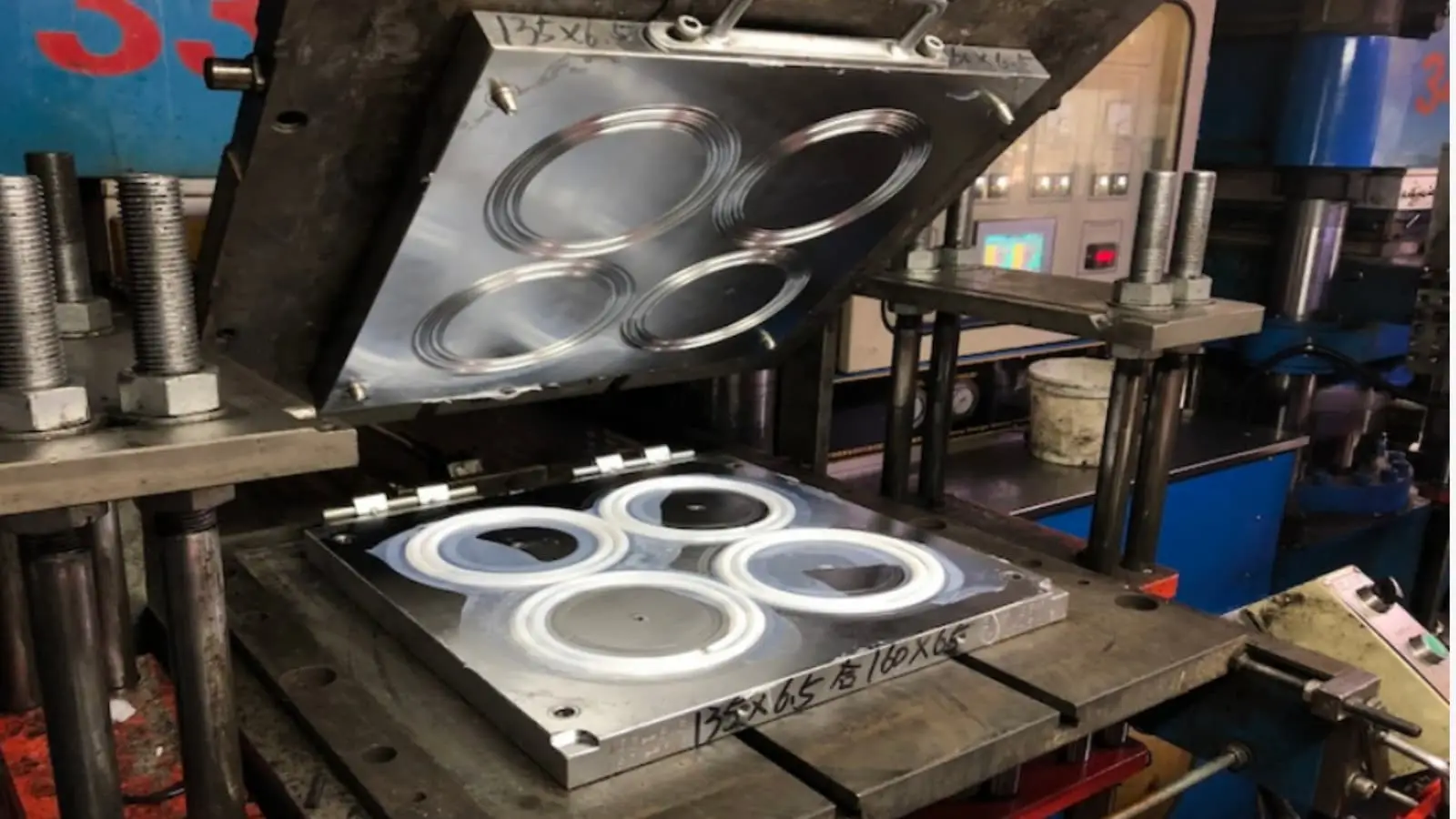 Illustrative example of compression mold from Google Search