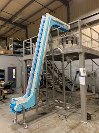 Vertical Conveyor | Arsai Conevyor Systems Pvt. Ltd. - vertical conveyor