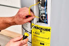 How to Replace a Heating Element in an Electric Water Heater - The Spruce - heater element