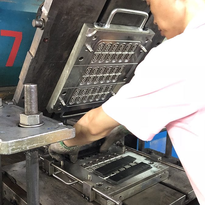 Illustrative example of rubber compression molding from Google Search